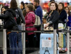 Австралийн  нисэх онгоцны  буудлуудад  урт  дараалал  үүсээд байна