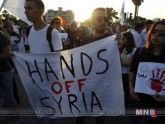 Сирид агаарын цохилт өгснийг эсэргүүцэгчдийн жагсаал боллоо