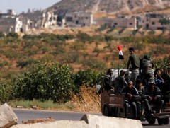 Сирийн Курд дайчид Рас-эль-айн хотыг орхин гарчээ 