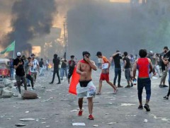 Иракт жагсагчид болон цагдаа нарын мөргөлдөөний үеэр 60 хүн амиа алдаад байна