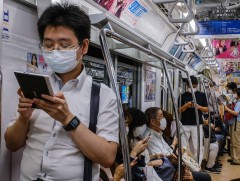 Япон “Дотооддоо аялцгаая” аяныг түр хугацаанд зогсооно 